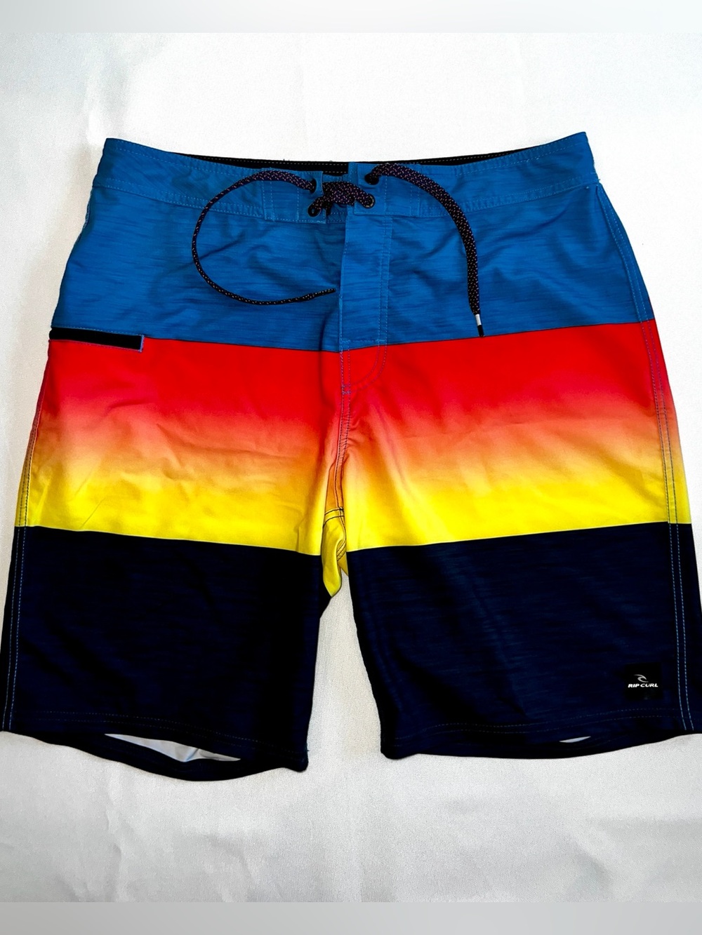 Rip Curl Men’s Mirage Divided Blue/Red/Yellow/Black Gradient Board Shorts sz 33